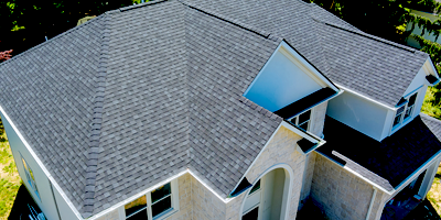 House with asphalt shingle roof